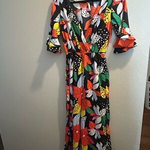 True Destiny Black jumpsuit with Red, Green, Yellow & White Leaf Print
